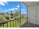 Enjoy beautiful community and landscape views from this screened-in private balcony at 381 S Mcmullen Booth Rd # 72, Clearwater, FL 33759