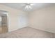 Comfortable bedroom featuring neutral carpet and a large closet providing ample storage space at 381 S Mcmullen Booth Rd # 72, Clearwater, FL 33759