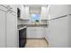 Bright kitchen with white cabinets, granite countertops, and modern appliances at 381 S Mcmullen Booth Rd # 72, Clearwater, FL 33759