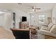 Comfortable living room featuring modern decor, bright lighting, and wood-look floors at 3906 N Ola Ave, Tampa, FL 33603