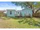 Charming home featuring a deck and well-maintained backyard, perfect for outdoor enjoyment at 3906 N Ola Ave, Tampa, FL 33603