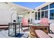 Charming backyard featuring a brick patio with outdoor furniture, fire pit, and well-manicured landscaping at 430 44Th Ne Ave, St Petersburg, FL 33703