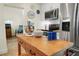 Close-up of a well-equipped kitchen with stainless steel appliances and charming décor at 430 44Th Ne Ave, St Petersburg, FL 33703