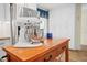 A mixer sits on the kitchen counter with other kitchen items nearby, the cupboards behind are white at 430 44Th Ne Ave, St Petersburg, FL 33703
