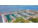 Aerial view of a large marina filled with boats docked along the waterfront on a clear, sunny day at 433 San Salvador Dr, Dunedin, FL 34698