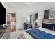 Comfortable bedroom with a large bed and two windows providing an elegant, and cozy atmosphere at 433 San Salvador Dr, Dunedin, FL 34698