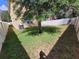 Spacious backyard featuring well maintained grass and privacy fence at 4633 White Bay Cir, Wesley Chapel, FL 33545