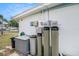 Exterior shot of the home featuring equipment that is attached to the exterior at 4707 Alma St, New Port Richey, FL 34652