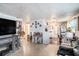 Open living space with a breakfast bar and a view into the modern kitchen, great for entertaining guests at 4707 Alma St, New Port Richey, FL 34652