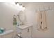Bright bathroom featuring a white vanity and brushed nickel hardware at 4997 Bostonian Loop, New Port Richey, FL 34655