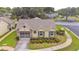 Charming single-story home with well-manicured lawn and attached garage at 4997 Bostonian Loop, New Port Richey, FL 34655