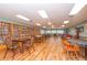 Clubhouse library with floor-to-ceiling bookshelves and cozy seating areas at 4997 Bostonian Loop, New Port Richey, FL 34655