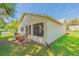 View of the patio with chairs and flowers at 4997 Bostonian Loop, New Port Richey, FL 34655