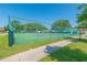 Community tennis courts with well maintained courts and blue skies at 4997 Bostonian Loop, New Port Richey, FL 34655