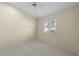 Bright bedroom featuring tile flooring and ample natural light at 5290 White Sand Ne Cir, St Petersburg, FL 33703