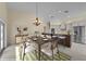 Dining area features a decorative light fixture, and open flow to the kitchen area, perfect for meals and gatherings at 5290 White Sand Ne Cir, St Petersburg, FL 33703