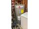 Hot water heater and miscellaneous items, including fishing gear, are being stored in the basement at 5443 Tangerine Dr, New Port Richey, FL 34652