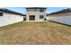 Large backyard featuring patio and privacy fence at 5942 Sweet Birch Dr, Riverview, FL 33578