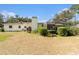 Spacious backyard featuring a partially screened patio, blending indoor-outdoor living at 626 Marphil Loop, Brandon, FL 33511