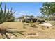 Sprawling backyard view showing lush trees, lawn, patio and surrounding landscape at 626 Marphil Loop, Brandon, FL 33511