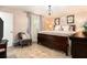 Inviting main bedroom with a comfortable bed, wood floors, and a bright window at 626 Marphil Loop, Brandon, FL 33511