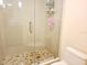 Contemporary bathroom highlighting a glass enclosed shower with stylish tile flooring at 6265 Sun Blvd # 805, St Petersburg, FL 33715