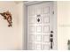 Elegant condo unit entrance featuring decorative door and hardware at 6265 Sun Blvd # 805, St Petersburg, FL 33715