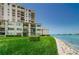 Picturesque waterfront condo with manicured lawn and bay view at 6265 Sun Blvd # 805, St Petersburg, FL 33715