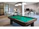 Relaxing game room featuring tables, chairs, billiards, and comfortable seating for resident enjoyment at 6265 Sun Blvd # 805, St Petersburg, FL 33715