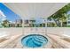 Relaxing hot tub area with pergola and views of the surrounding community at 6265 Sun Blvd # 805, St Petersburg, FL 33715