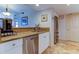 Modern kitchen with stainless steel appliances, granite countertops, and stylish flooring at 6265 Sun Blvd # 805, St Petersburg, FL 33715