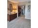 Inviting living space featuring carpeted floors and a decorative dresser with an open walk-in closet at 6265 Sun Blvd # 805, St Petersburg, FL 33715
