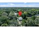 A home in a lush, green neighborhood surrounded by trees at 6709 N 13Th St, Tampa, FL 33604