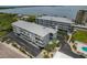 A beautiful waterfront condo complex with stunning water views and lush landscaping at 7 Island Park Pl # 204, Dunedin, FL 34698