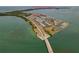 Aerial shot of the island community with easy access to beaches and Honeymoon Island at 7 Island Park Pl # 204, Dunedin, FL 34698