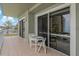 Cozy balcony with comfortable seating to enjoy the outdoor breeze and serene views at 7 Island Park Pl # 204, Dunedin, FL 34698
