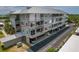 Beautiful exterior of the condo, showcasing the balcony and covered parking at 7 Island Park Pl # 204, Dunedin, FL 34698