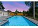 A nice view of the pool and fence in the backyard at 7050 Jenner Ave, New Port Richey, FL 34655
