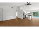 Spacious kitchen featuring white cabinets, stainless steel appliances, and an island overlooking the pool at 7050 Jenner Ave, New Port Richey, FL 34655