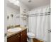 Bathroom featuring a shower and tub combination, sink, and neutral wall color at 7061 Lamium Ct, Brooksville, FL 34602