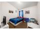 bedroom with twin bed, cartoon decor, and plenty of natural light at 7061 Lamium Ct, Brooksville, FL 34602