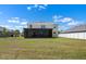 Expansive backyard featuring a screened lanai, perfect for outdoor relaxation and entertaining at 718 Tidal Rock Ave, Ruskin, FL 33570