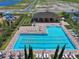 Inviting community pool area with ample seating, perfect for relaxation and social gatherings in a Gathering-friendly environment at 718 Tidal Rock Ave, Ruskin, FL 33570