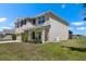 Beautiful two-story home showcasing landscaped front yard and welcoming entryway at 718 Tidal Rock Ave, Ruskin, FL 33570