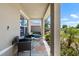 Inviting covered front porch with outdoor seating, perfect for relaxing and enjoying the view at 718 Tidal Rock Ave, Ruskin, FL 33570