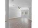 A spacious bedroom featuring light gray walls, crown molding, and great natural lighting at 7314 Hunt Club Ln, Seminole, FL 33776