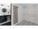 Well-appointed closet featuring an organizer, wire shelving and patterned tile flooring at 7314 Hunt Club Ln, Seminole, FL 33776