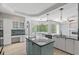 Large kitchen with desk space, stainless appliances, and center island perfect for entertaining at 7314 Hunt Club Ln, Seminole, FL 33776