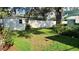 Spacious backyard with storage shed and white vinyl fence at 7336 20Th N St, St Petersburg, FL 33702