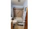 Bathroom with a tub and shower combination, grab bars, and updated fixtures at 7336 20Th N St, St Petersburg, FL 33702